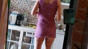 Crossdressing maid in transparent dress cleans house