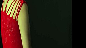 O femeie uimitoare cu sâni fermecători te ademenește într-o ipostază provocatoare în timp ce porți o rochie roșie seducătoare